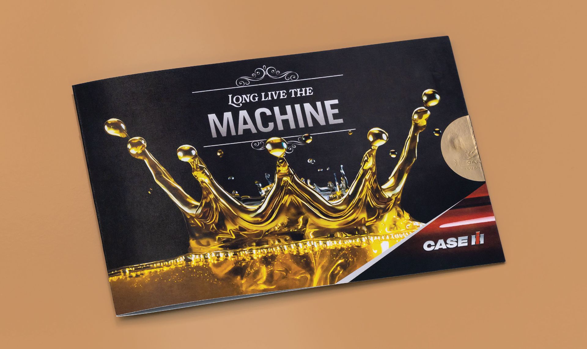 Brochure cover: 'Long Live the Machine' with golden oil splash forming a crown and the CASE IH logo.